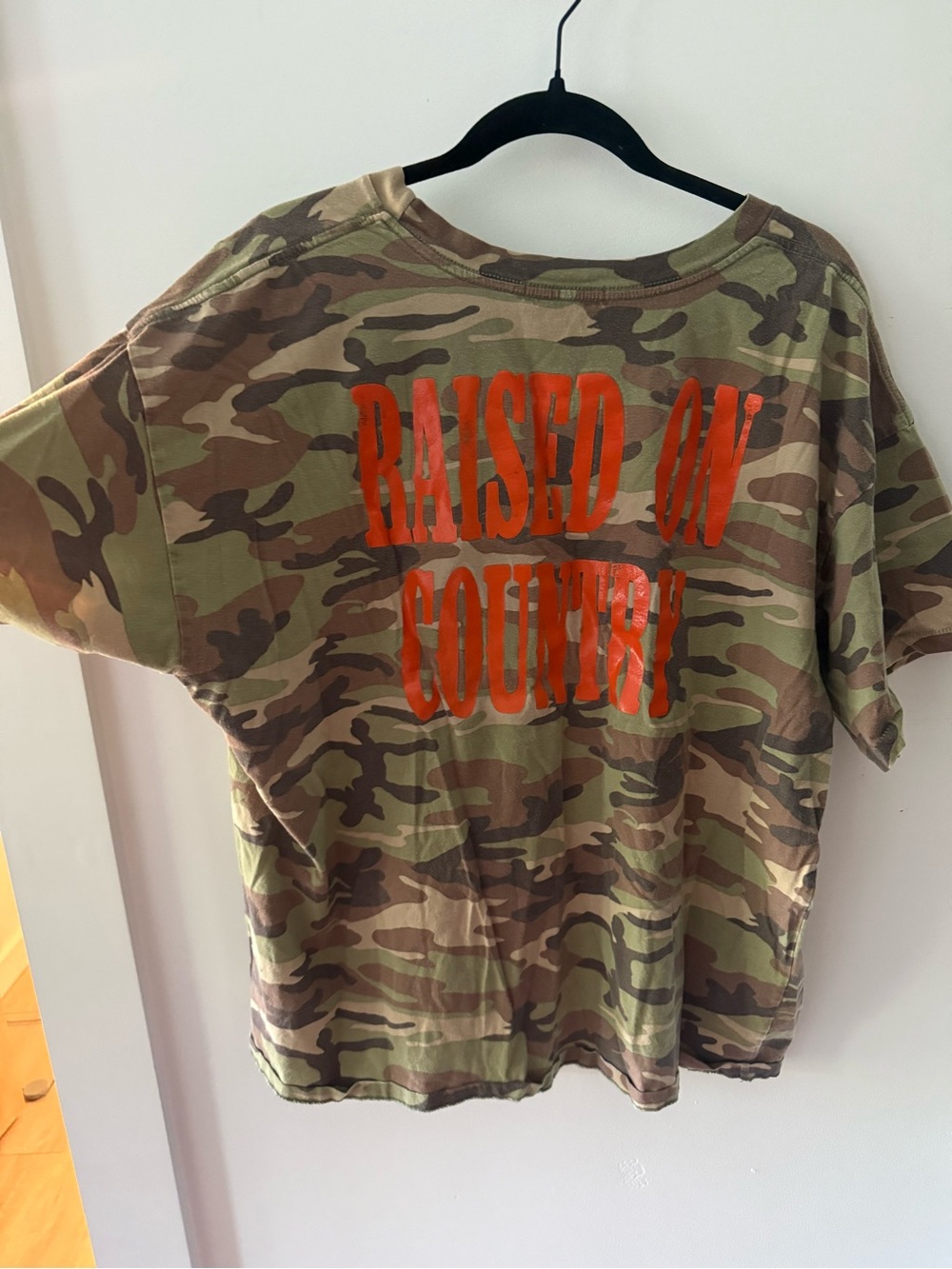 Daydreamer Camo Tee with Bright Orange 'Raised on Country' Graphic